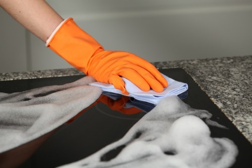 Professional cleaner maintaining a retail space near Elephant and Castle